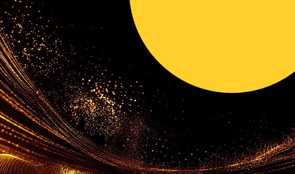 Swirls of golden sparkles against a black background